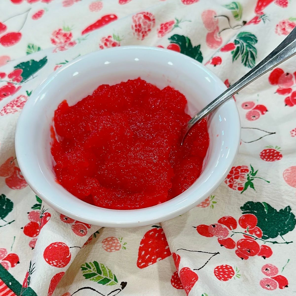 Serving of Applesauce Jello in a bowl.