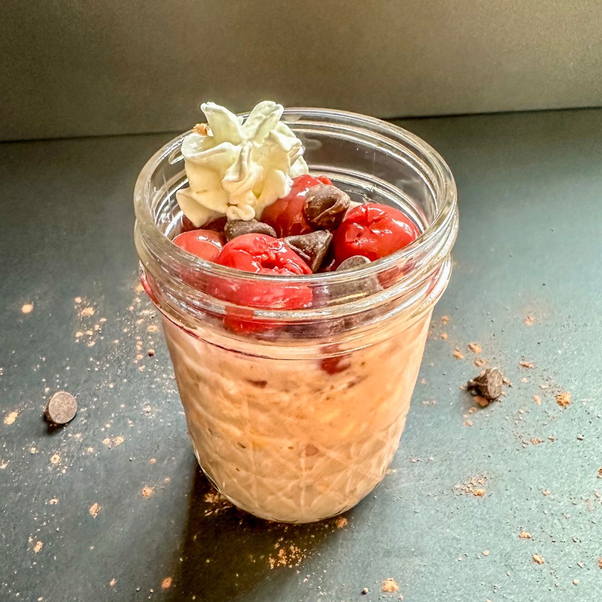 Finished Black Forest Overnight Oats in a jar.