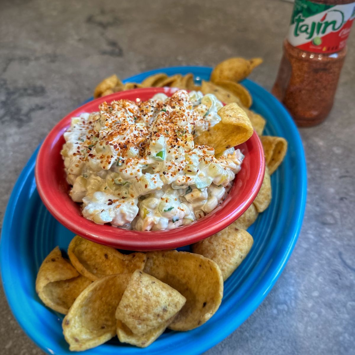 Serving of Corn Dip with Fritos. 