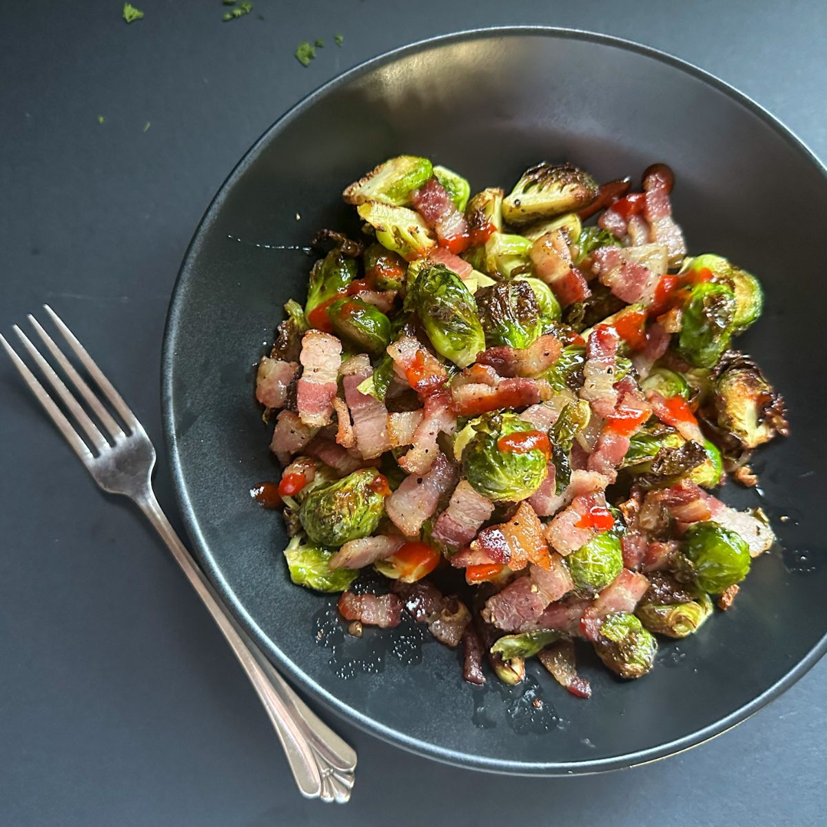 Air Fried Honey Sriracha Brussels Sprouts on a plate.