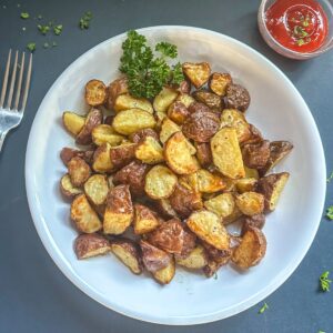 Finished Red Potatoes garnished with parsley.