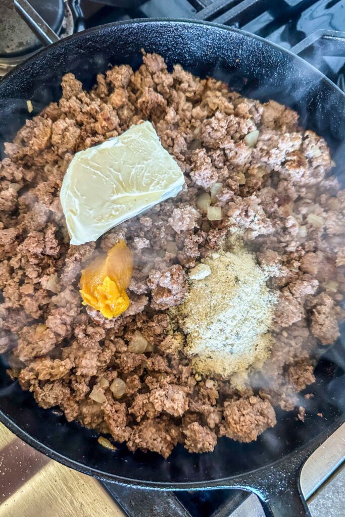 add-the-ranch-dressing-packet-into-the-ground-beef-mixture Add the cream cheese and the ranch seasoning packet.