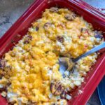 Cheesy Kielbasa Hash Brown Casserole in a baking dish.