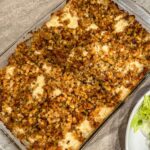 Dished rotisserie chicken and stuffing casserole.