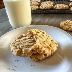 Baked Peanut Butter Cookies with a glass of milk.