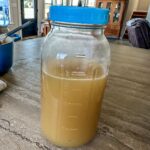 Turkey Bone Broth in a jar with a lid.