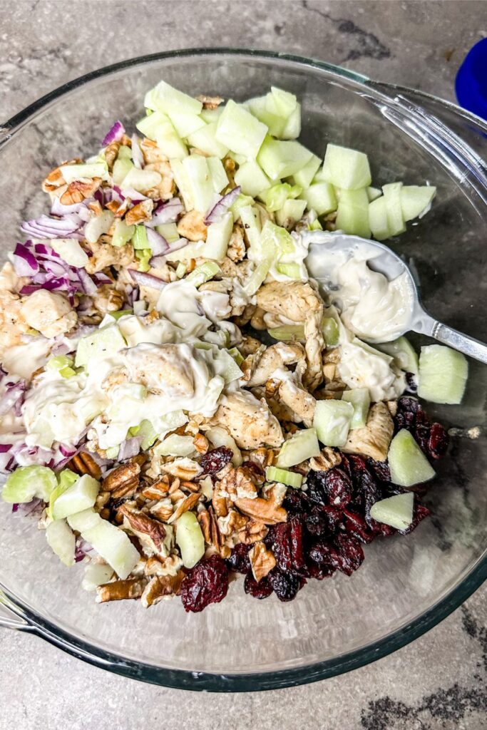 mixing easy chicken salad.