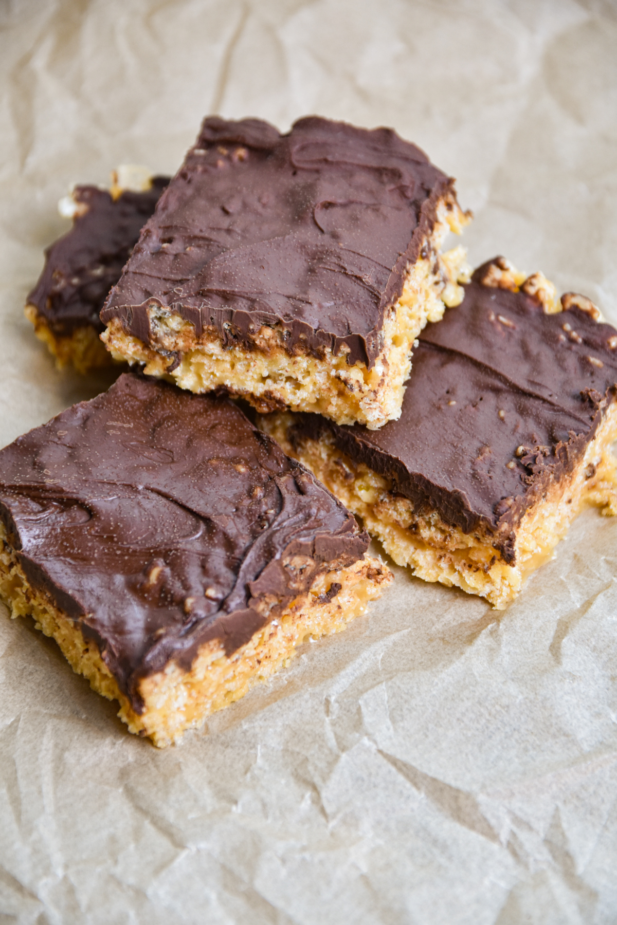 Chocolate peanut butter rice krispie treats cut.