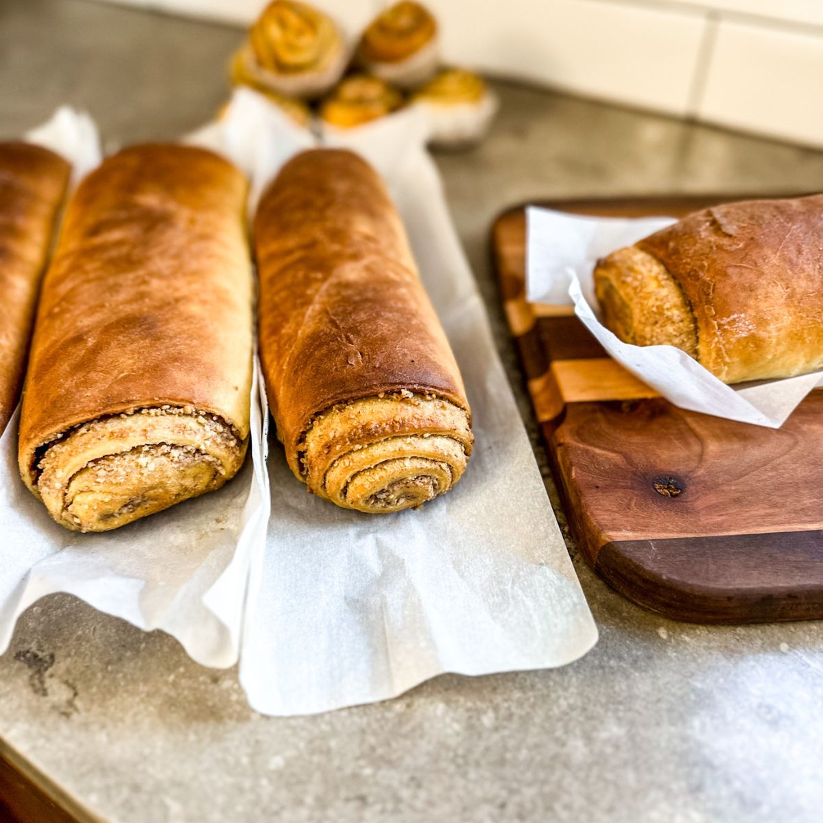golden brown potica rolls ready to be cut.