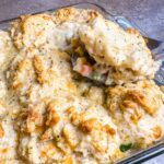 serving Red Lobster Biscuit Chicken Casserole out of a 11x7 casserole dish.
