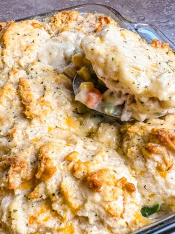 serving Red Lobster Biscuit Chicken Casserole out of a 11x7 casserole dish.