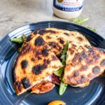 BLT Quesadilla served on a grey plate.
