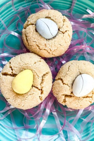 Cadbury egg mini cookies served on a robin egg blue plate.