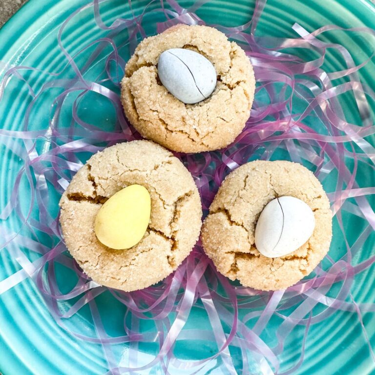 Cadbury egg mini cookies served on a robin egg blue plate.