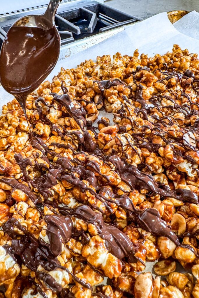 Ingredients needed to make chocolate drizzled caramel corn.