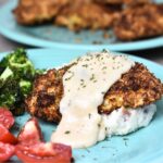 Parmesan Crusted Chicken served with a ranch gravy.