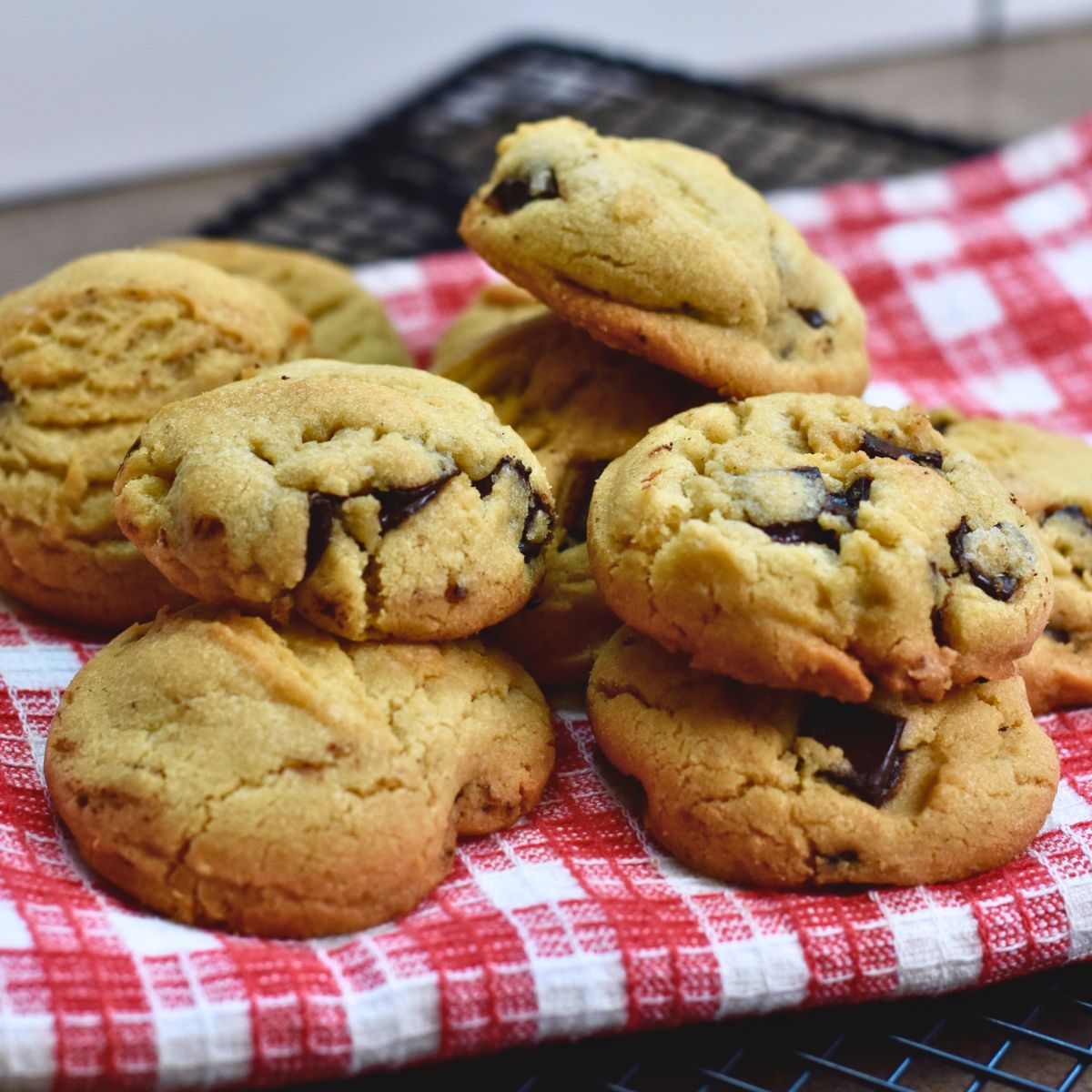 Cookies are served on a red and white towel to guests.
