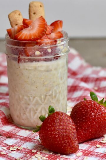 Ready-to-eat strawberry cheesecake overnight oats.