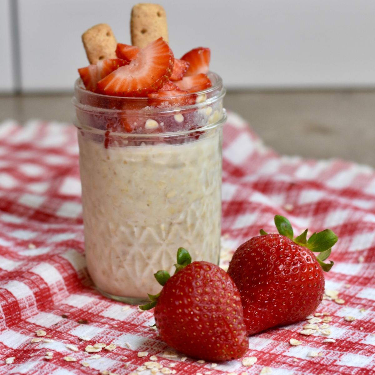 Ready-to-eat strawberry cheesecake overnight oats.