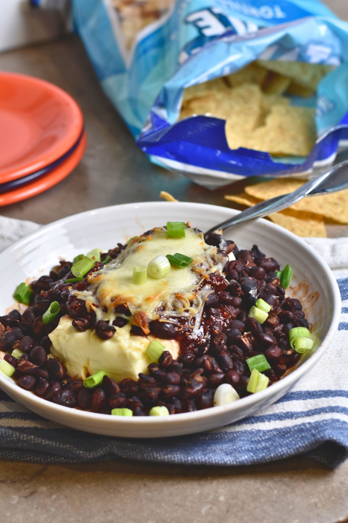 serving the raspberry chipotle dip to guest.