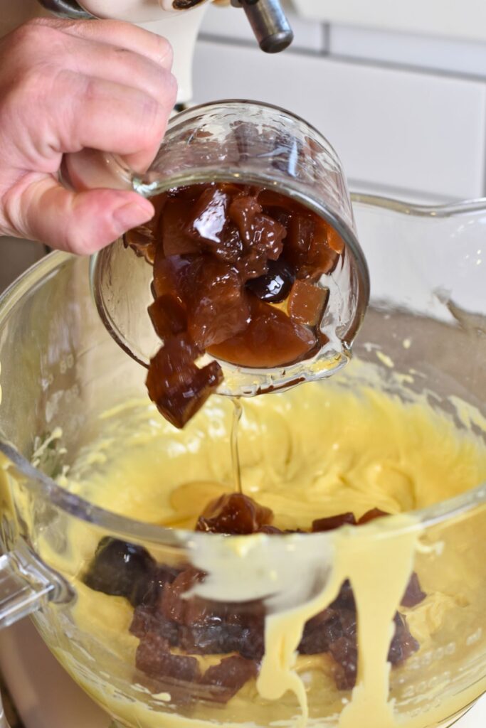 mixing-the-batter-for-the-rumtopt-cake Add the rumtopf mixture into the cake batter.