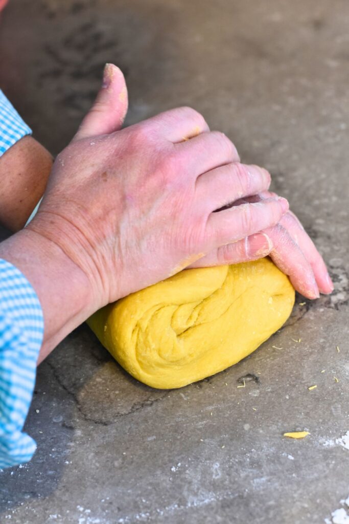 knead-the-dough-for-ten-minutes Kneading the pappardelle dough together.
