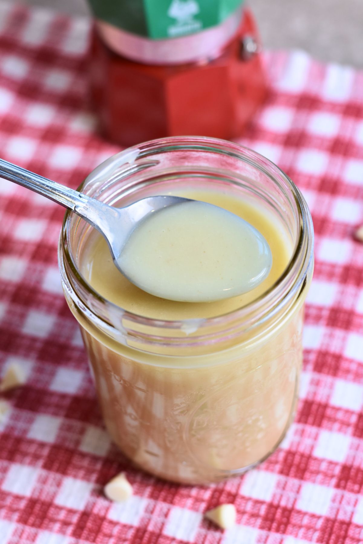 serving-white-chocolate-syrup A spoonful of white chocolate syrup.