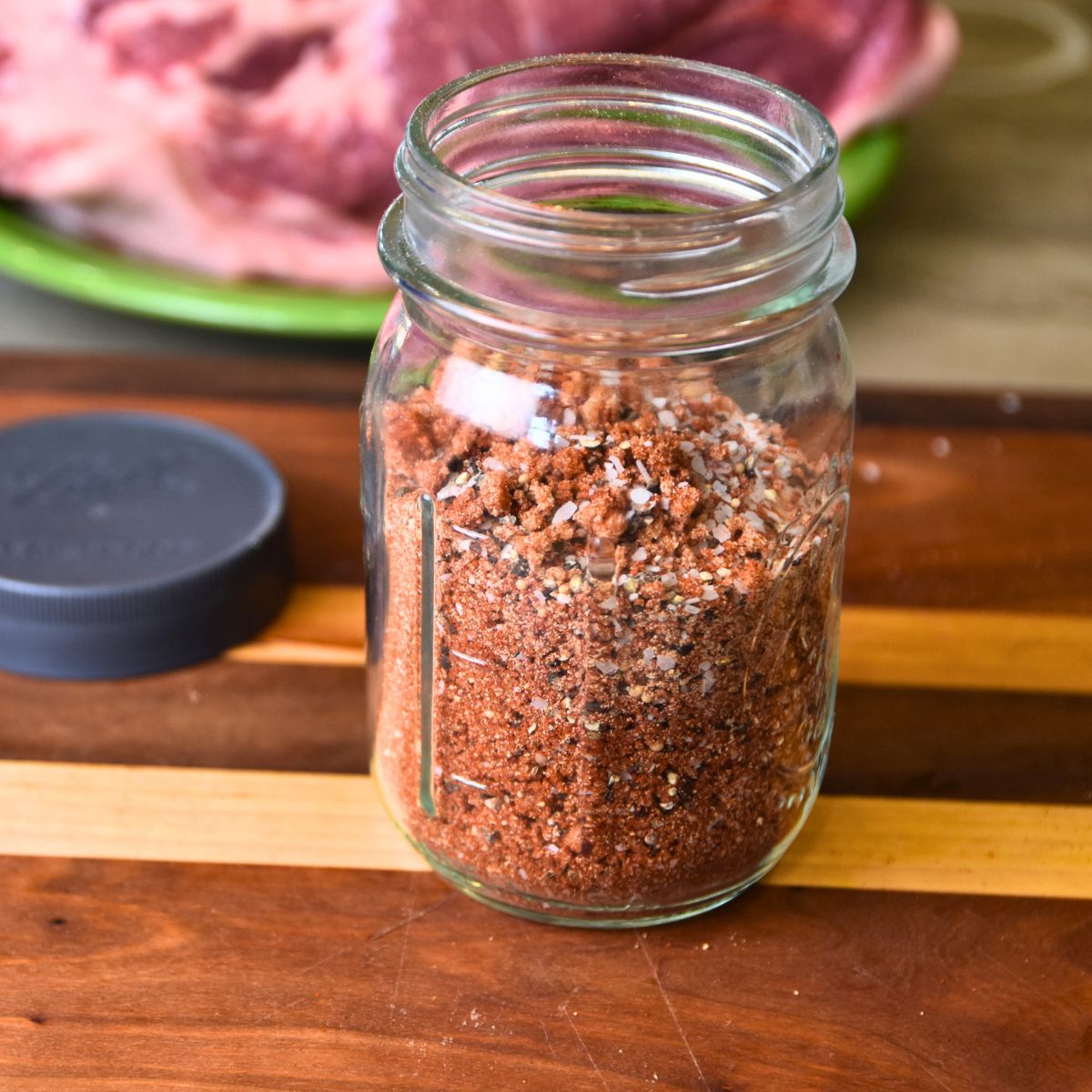 Storing the pulled pork rub in an air-tight mason jar.