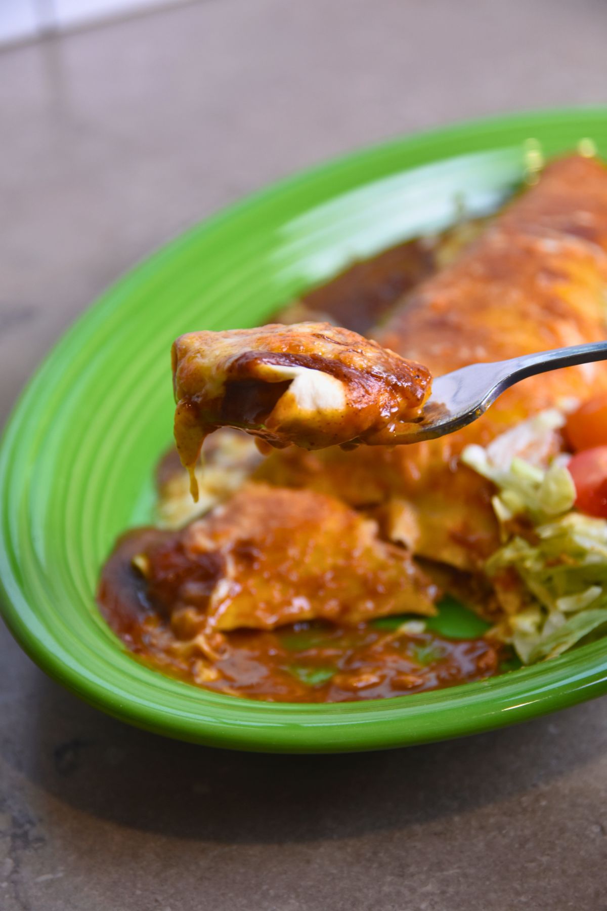 eating-burrito-enchilada-style-with-fork Eating the burrito enchilada with a fork.