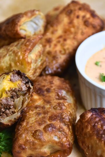 Ready-to-eat cheeseburger spring rolls.