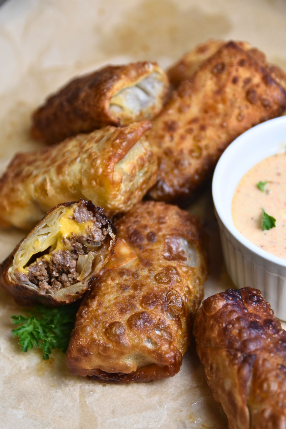 Cheeseburger-srping-rolls-served-on-game-day Crispy golden cheeseburger spring rolls.