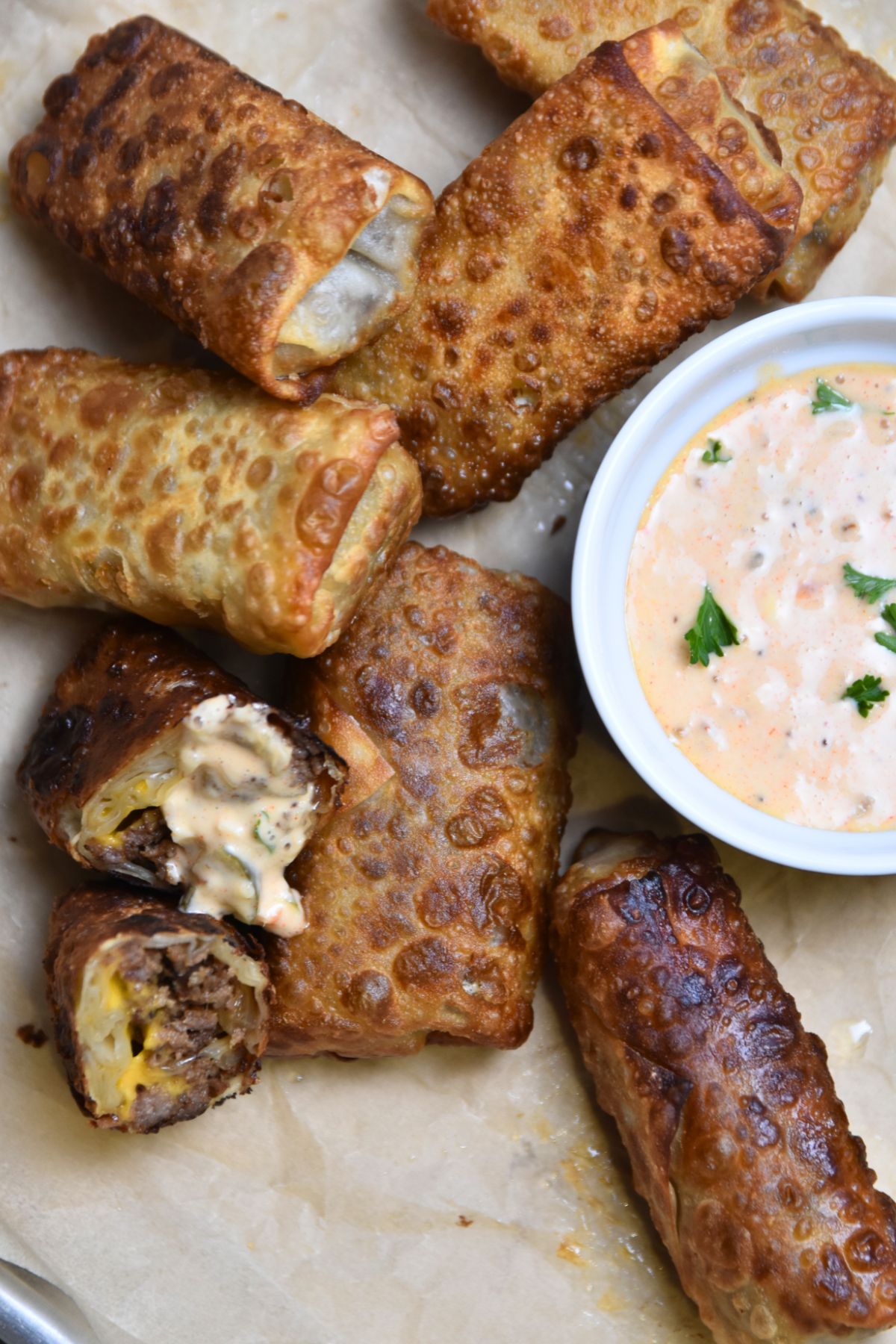 Crispy-cheeseburger-spring-rolls-served-with-big-mac-sauce Finished cheeseburger spring rolls served with Big Mac sauce.