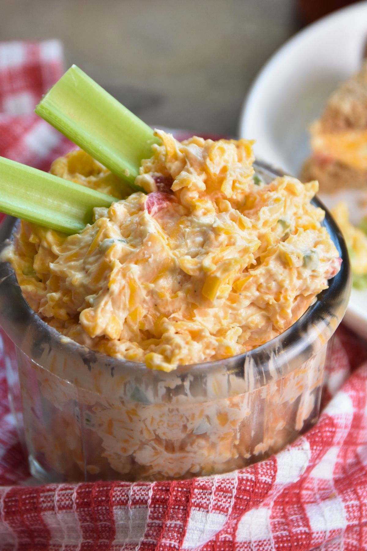 serving-the-creamy-and-spicy-cheese-to-guest Serving the jalapeno pimento cheese with crackers and celery.