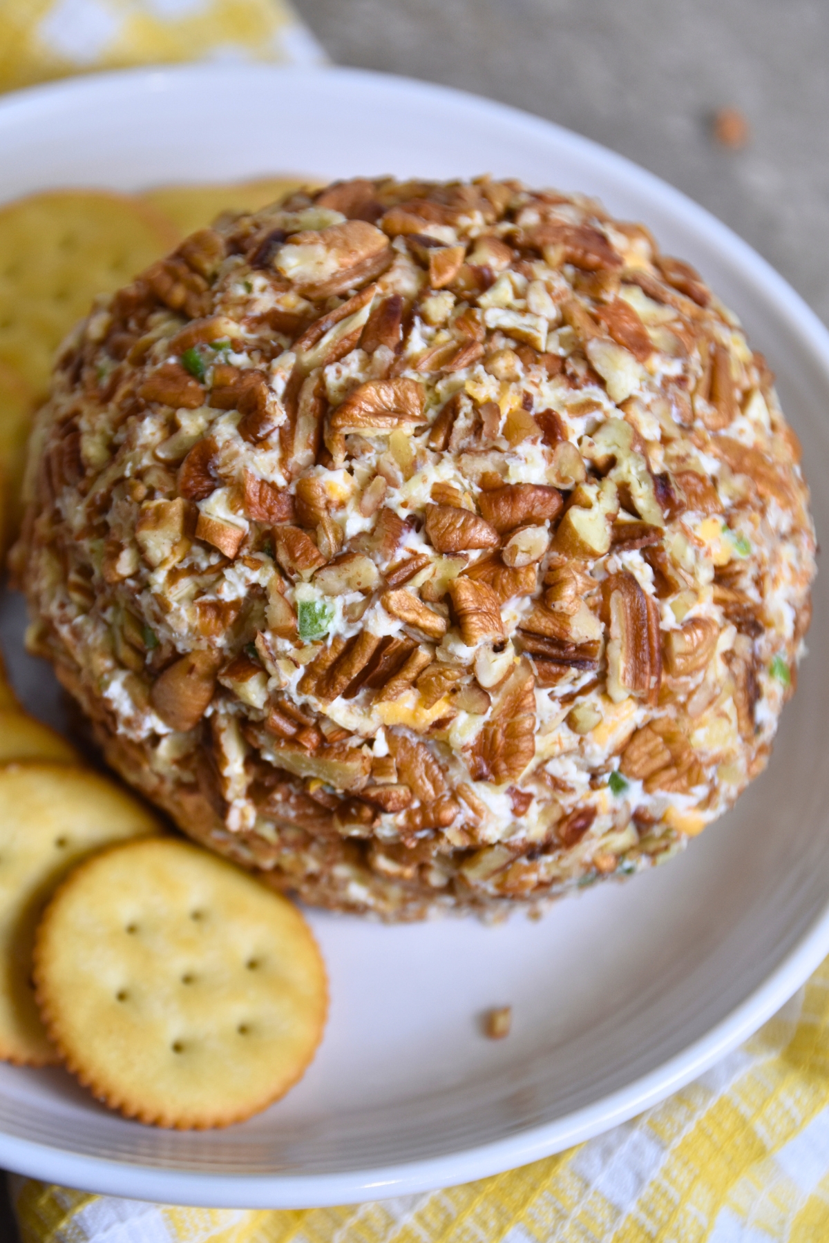 pineapple-cheese-ball-covered-in-pecans Crushed pecans cover the pineapple cheese ball.