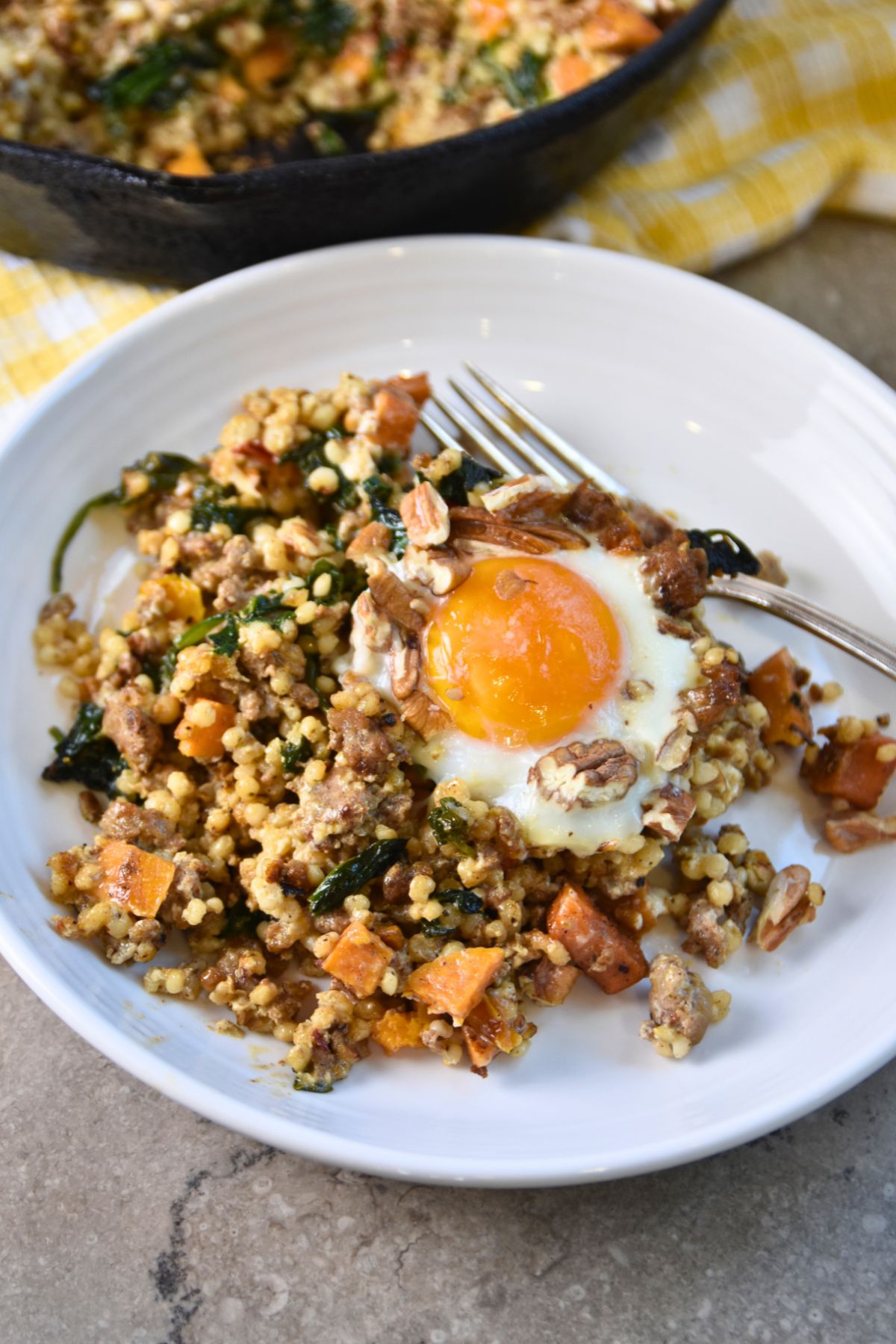 ready-to-eat-sorghum-breakfast-casserole Serving sorghum and sausage breakfast skillet.