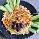Serving hummus with cucumbers.