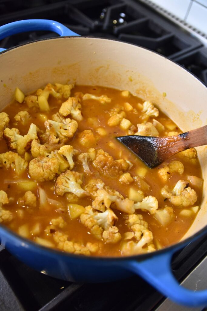 Saute-the-base-of-the-soup Mix the cauliflower mixture in your dutch oven.