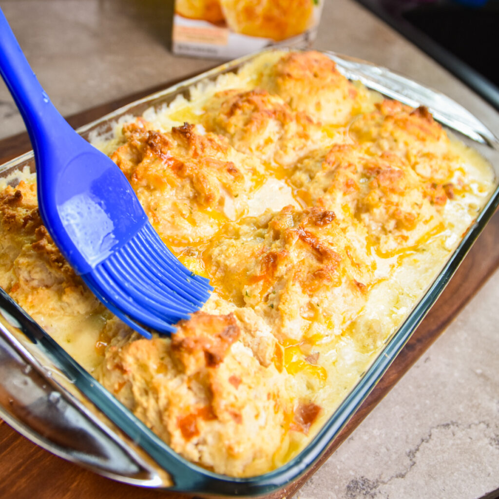 Brush tops of biscuits with garlic butter.