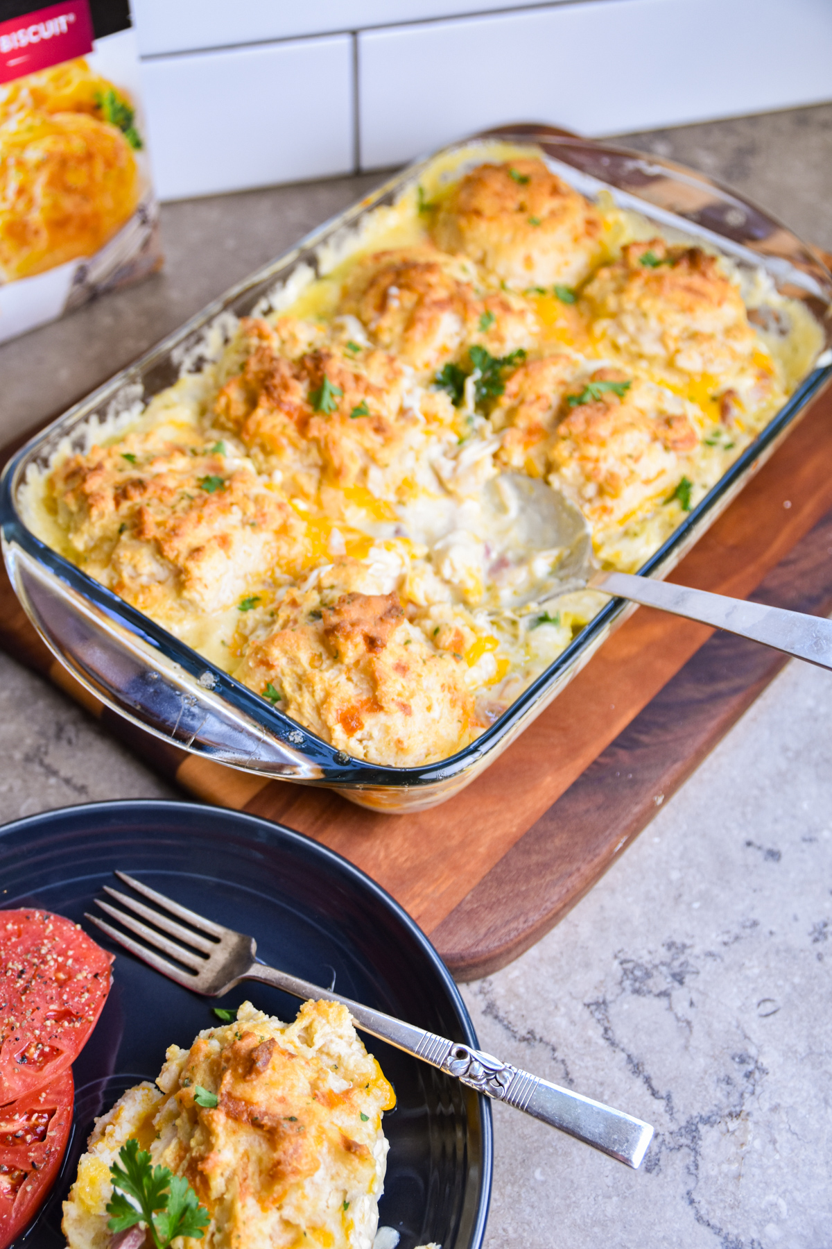 Serving chicken casserole.