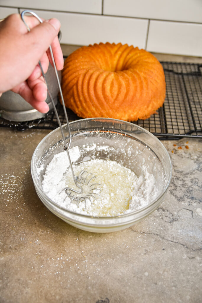 Making lemon jello cake icing.