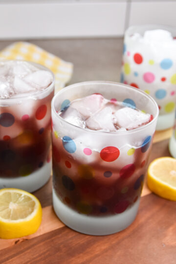 Four glasses of purple party punch