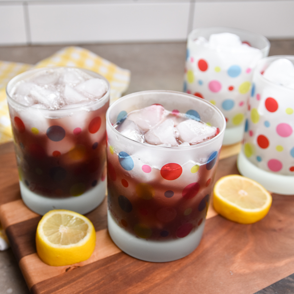 Glasses of purple party punch Four glasses of purple party punch