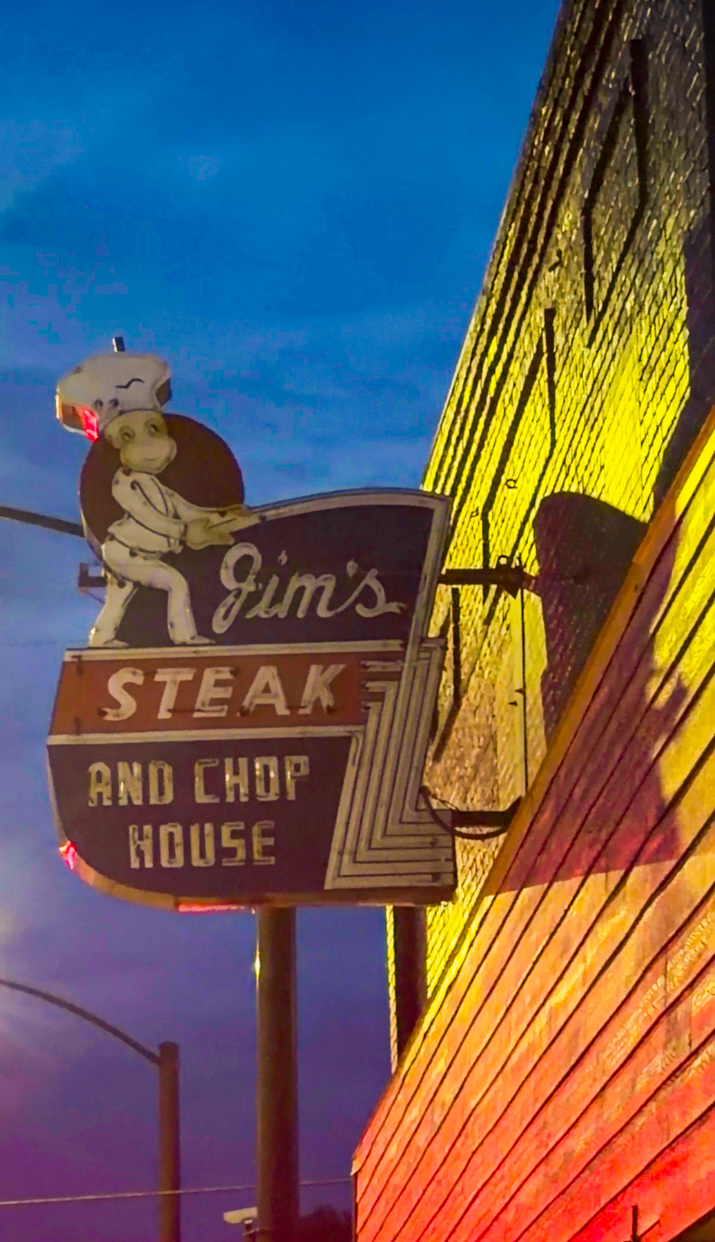 Jim's Steakhouse vintage neon light.